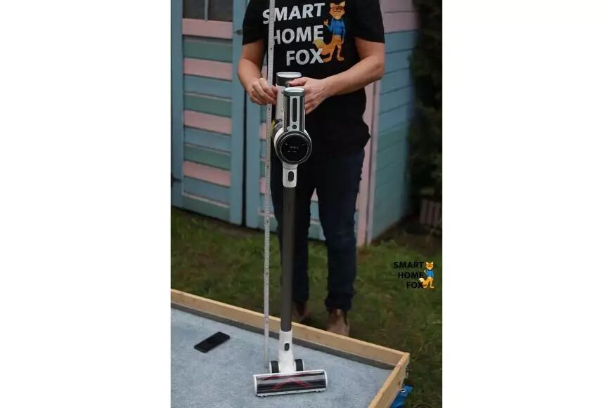 The Tineco S12 PureOne stick vacuum is being measured.